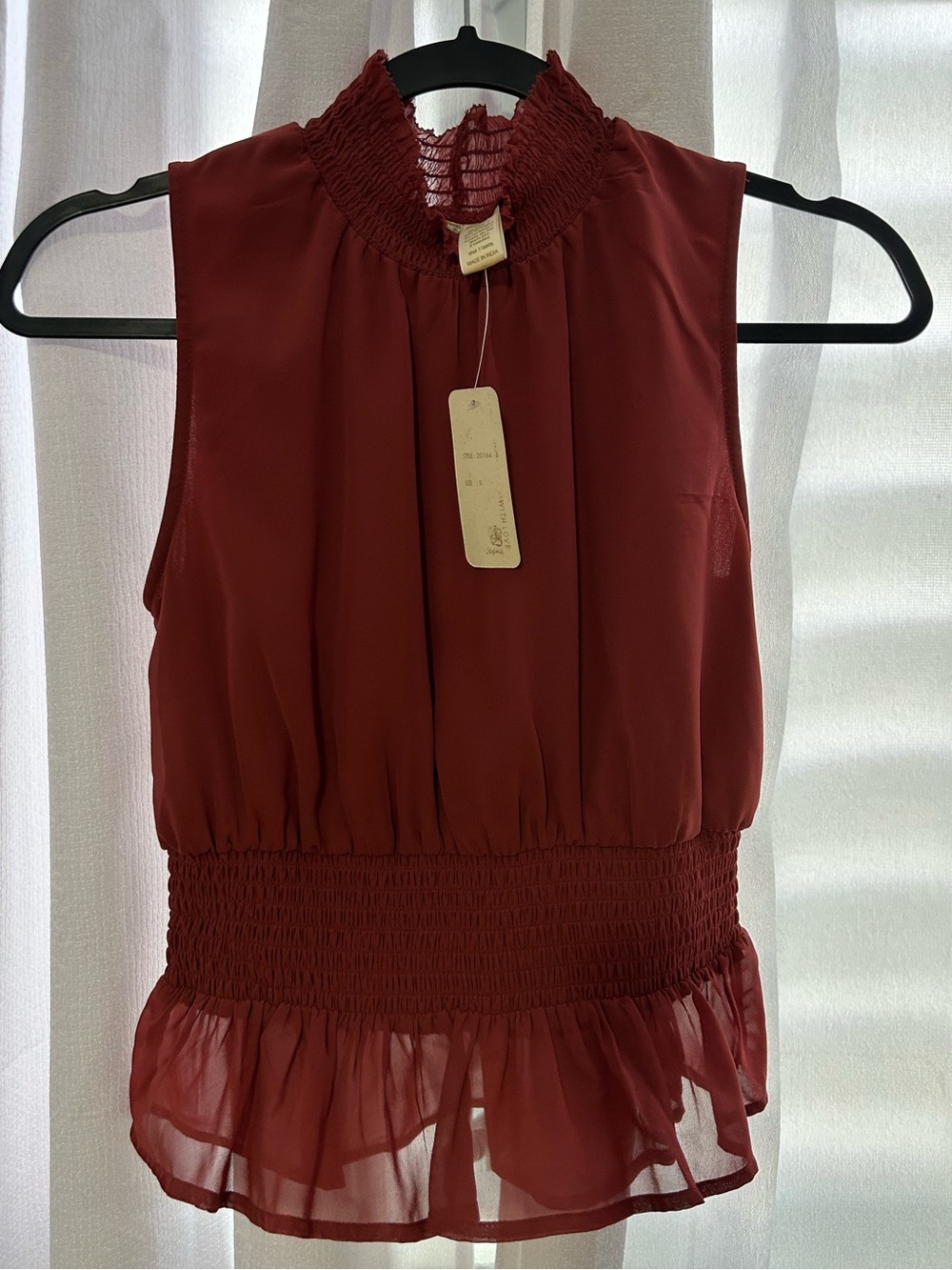 Japna Sleeveless Smocked Waist Ruffle Hem Top in Burgundy